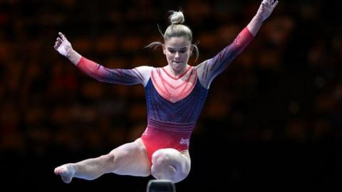 Alice Kinsella balancing on the beam