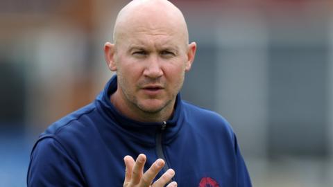 John Sadler speaks to the Northants players