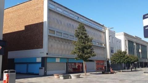 Co-Operative House on Sunderland's High Street West. The former Argos store is closed.