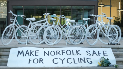 White bikes outside the offices of Norfolk County Council