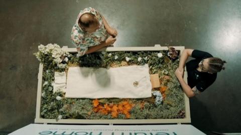 human composting coffin