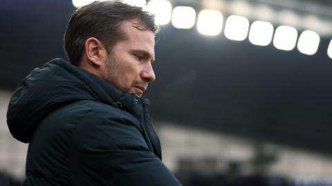 Watford manager Tom Cleverley watches his team play at Derby County