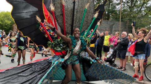 The Carnival Queen led the parade through Leicester with crowds cheering for the city's 40th Caribbean Carnival in 2025.