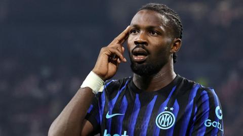 Marcus Thuram celebrates scoring for Inter Milan