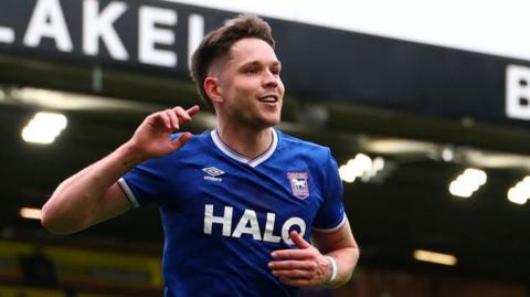 George Hirst celebrates