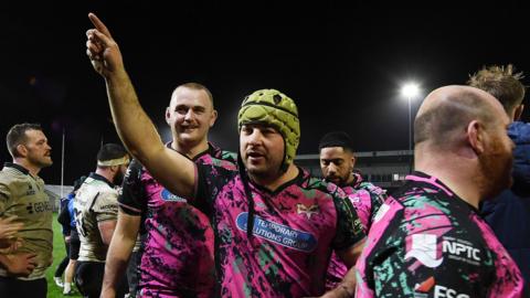 Ospreys flanker Harri Deaves salutes supporters after the comeback win against Connacht in Bridgend