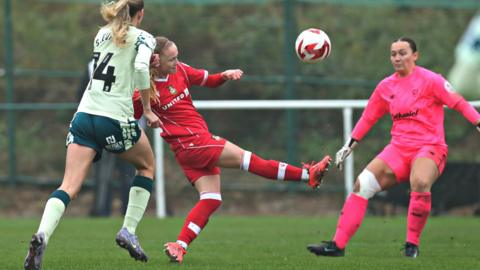 Katie Barker lobs Wrexham into the lead in their 1-1 draw against Cardiff