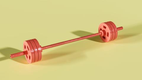 A barbel with three weights on each end. The barbel is orange and the background a pale yellow. 