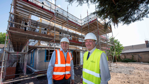 Gavin Ward, Morro Partnerships West Midlands operations director with councillor Steve Evans, deputy council leader on site at the development.
Both are stood in front the the building work with high-vis tops on over shirts and trousers.
