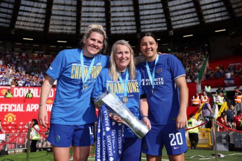 Emma Hayes, Millie Bright and Sam Kerr celebrate Chelsea winning the WSL