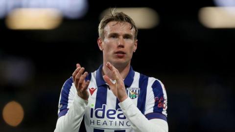 Tobjorn Heggem claps the fans after a match