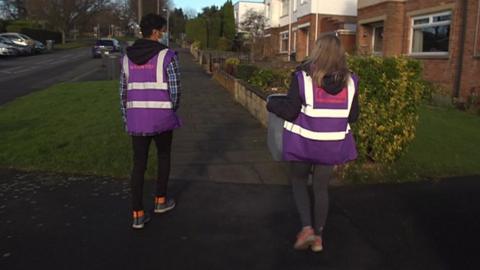 Door-to-door test team