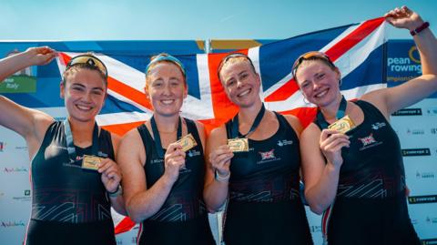 The women's four celebrate their win at the European Championships