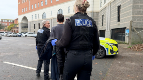 Police with shoplifters