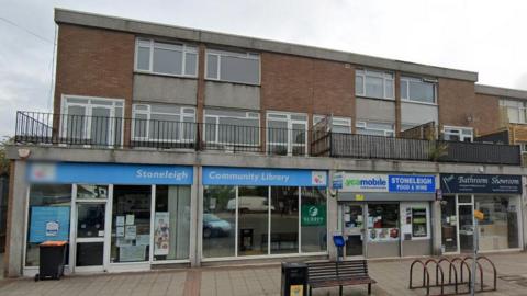 Stoneleigh Community Library with flats and a balcony above it