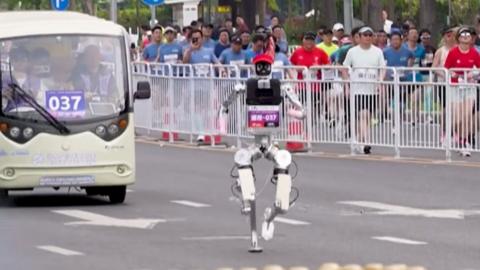 A robot runs on a street in Beijing