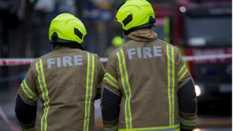 Fire fighters attend a fire in premises on the Walworth Road