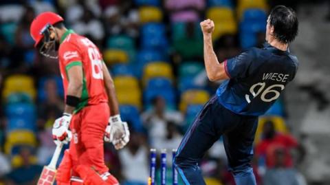 Namibia's David Wiese celebrates against Oman in the Men's T20 World Cup