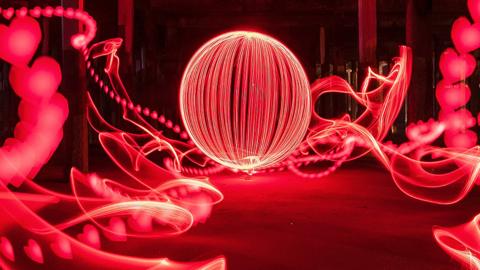 Valentine's Day light painting featuring red hearts under Walton Pier at low tide