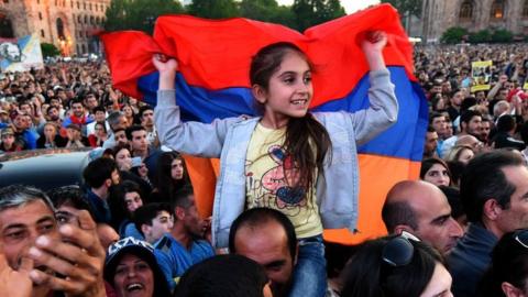 Supporters of Armenia"s protest leader Nikol Pashinyan attend a rally in downtown Yerevan on April 26, 2018