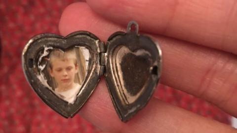 The locket Fiona Leahy found in Oxfam which contains a photo of a young boy