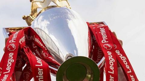 The Premier League trophy
