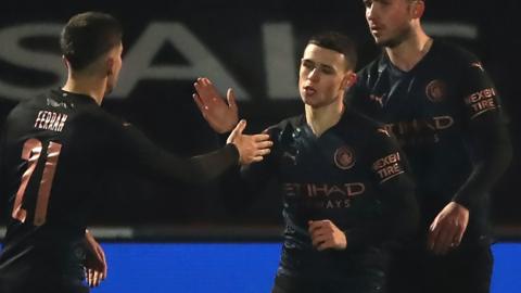 Phil Foden (centre)