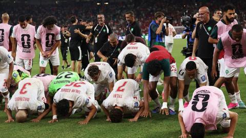 Morocco players pray
