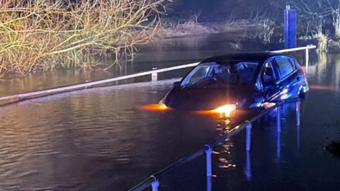 Car in floodwater