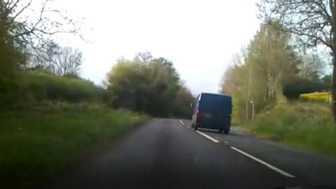 The van driving dangerously