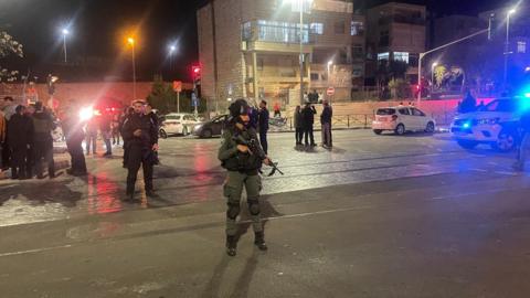 Emergency services work at the scene of a shooting at a synagogue in Neve Yaakov area of Jerusalem, Israel, 27 January 2023. According to a police spokesperson, at least eight people were killed and several injured in a shooting attack at a synagogue.