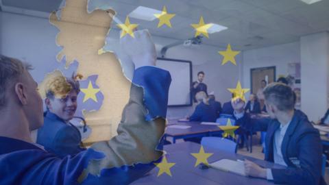 A Brexit map laid over a classroom