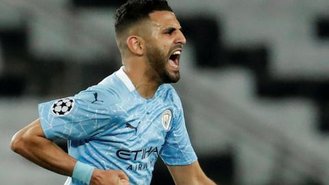 Manchester City's Riyad Mahrez celebrates scoring against Paris St-Germain in the Champions League semi-final first leg