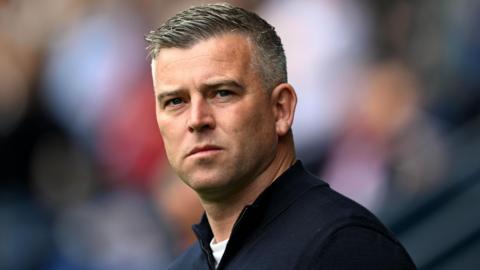 Steven Schumacher looks on during Bolton's game against Luton