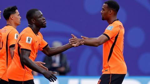 Netherlands' Brian Brobbey celebrates scoring against Tunisia