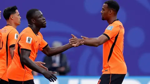 Netherlands' Brian Brobbey celebrates scoring against Tunisia
