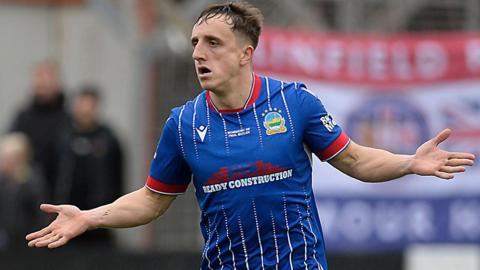 Joel Cooper celebrates after putting Linfield ahead two minutes after Kyle McClean had equalised for the Blues