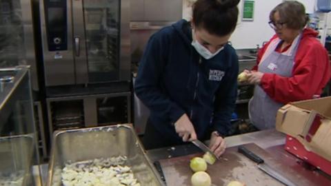 Volunteers preparing food at The People's Kitchen