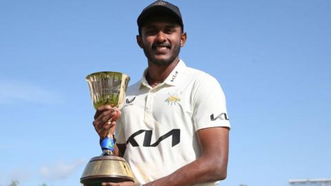 Sai Sudharsan poses with the County Championship Division One trophy