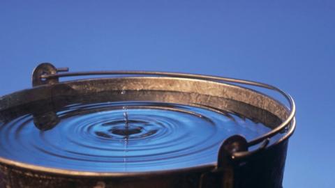 Water dripping into a bucket