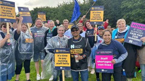 Nurses with placards