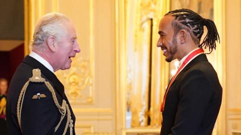Lewis Hamilton received his knighthood from Prince Charles