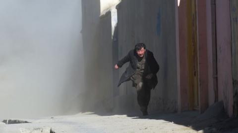 A man runs away from the blast, Kabul