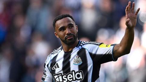 Callum Wilson waves to fans after Newcastle's Premier League game against Everton in May