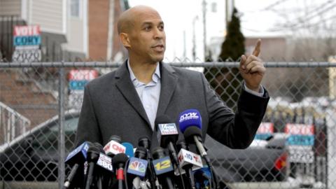 Cory Booker speaks to the press after his announcement