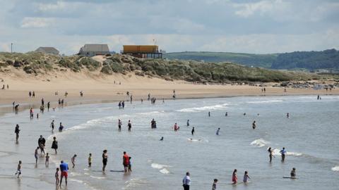 People paddling in Porthcawl