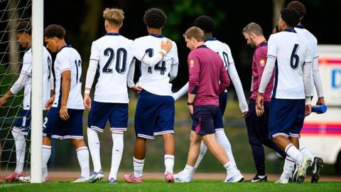 England Under-17s leave the field against Venezuela