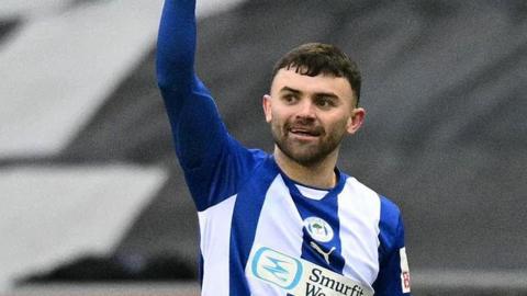 Jonny Smith in action for Wigan Athletic