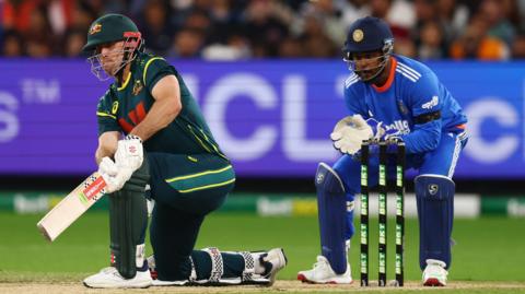 Mitchell Marsh batting for Australia with India wicketkeeper Sanju Samson stood up to the stumps
