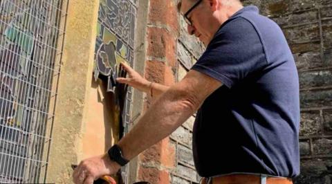 A stained-glass window was smashed during the burglary at St Andrew's Church in Ashburton